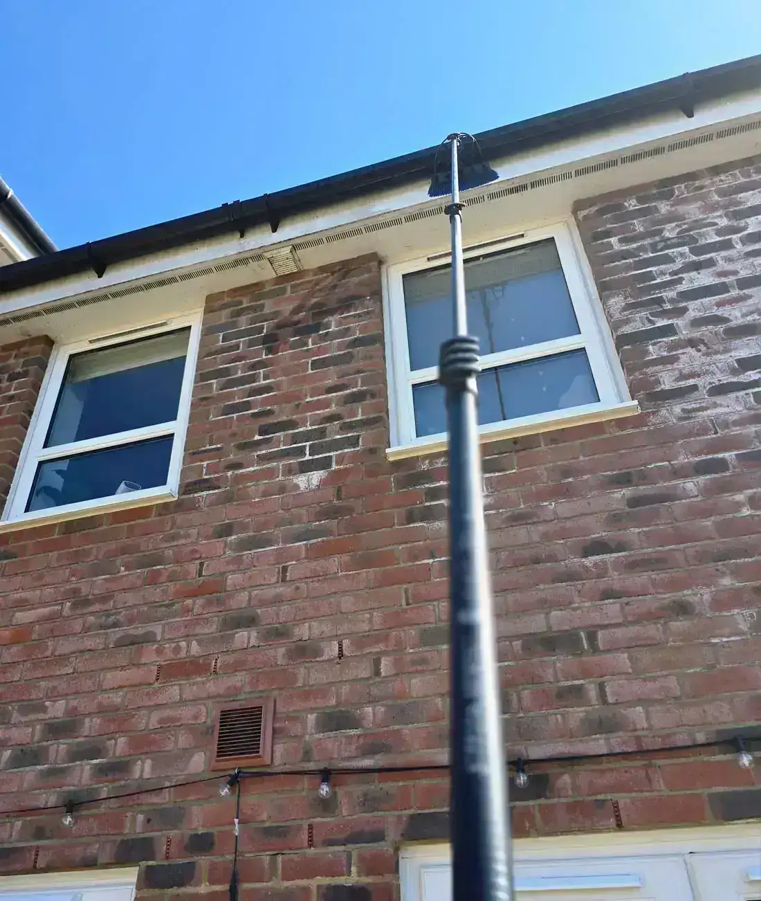 Fascia and soffit cleaning to lift algae, salt and road grime.